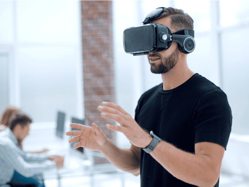 Man with virtual reality helmet