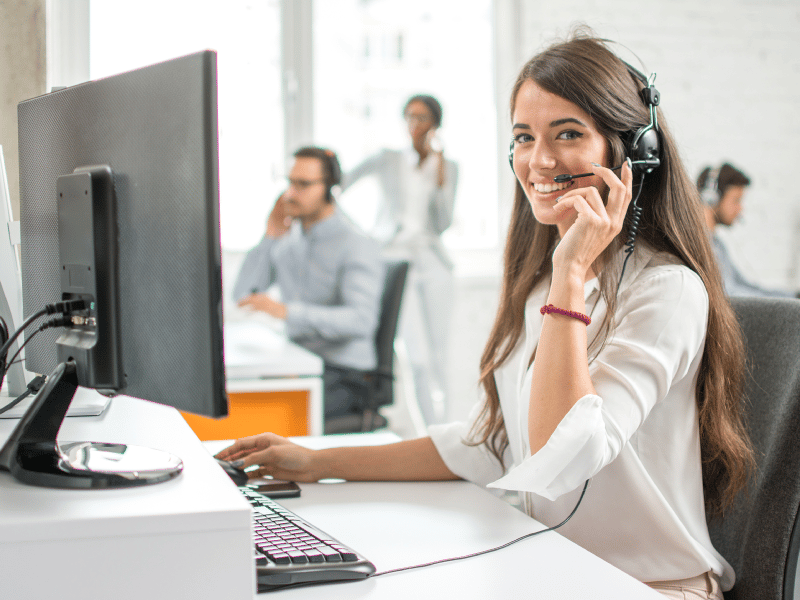 Woman in call center smiling